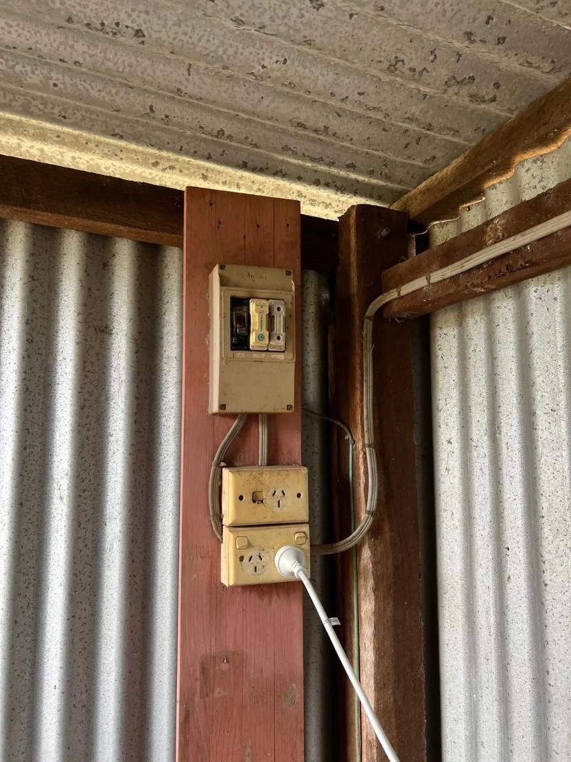 There Are Two Electrical Outlets on The Side of A Building — Next Level Resources In Rockhampton, QLD