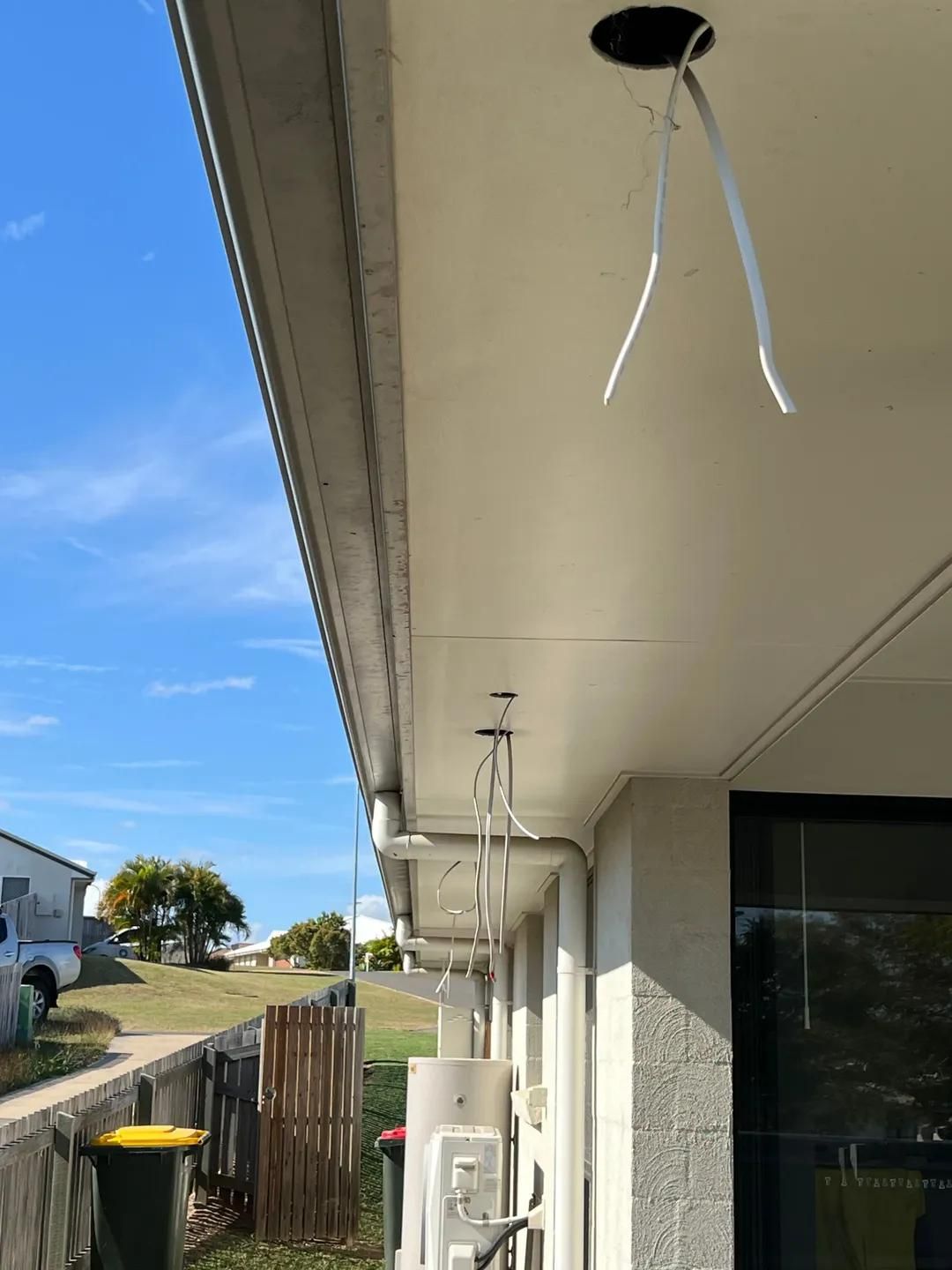 A Picture of A Roof with Wires Hanging from It — Next Level Resources In Rockhampton, QLD
