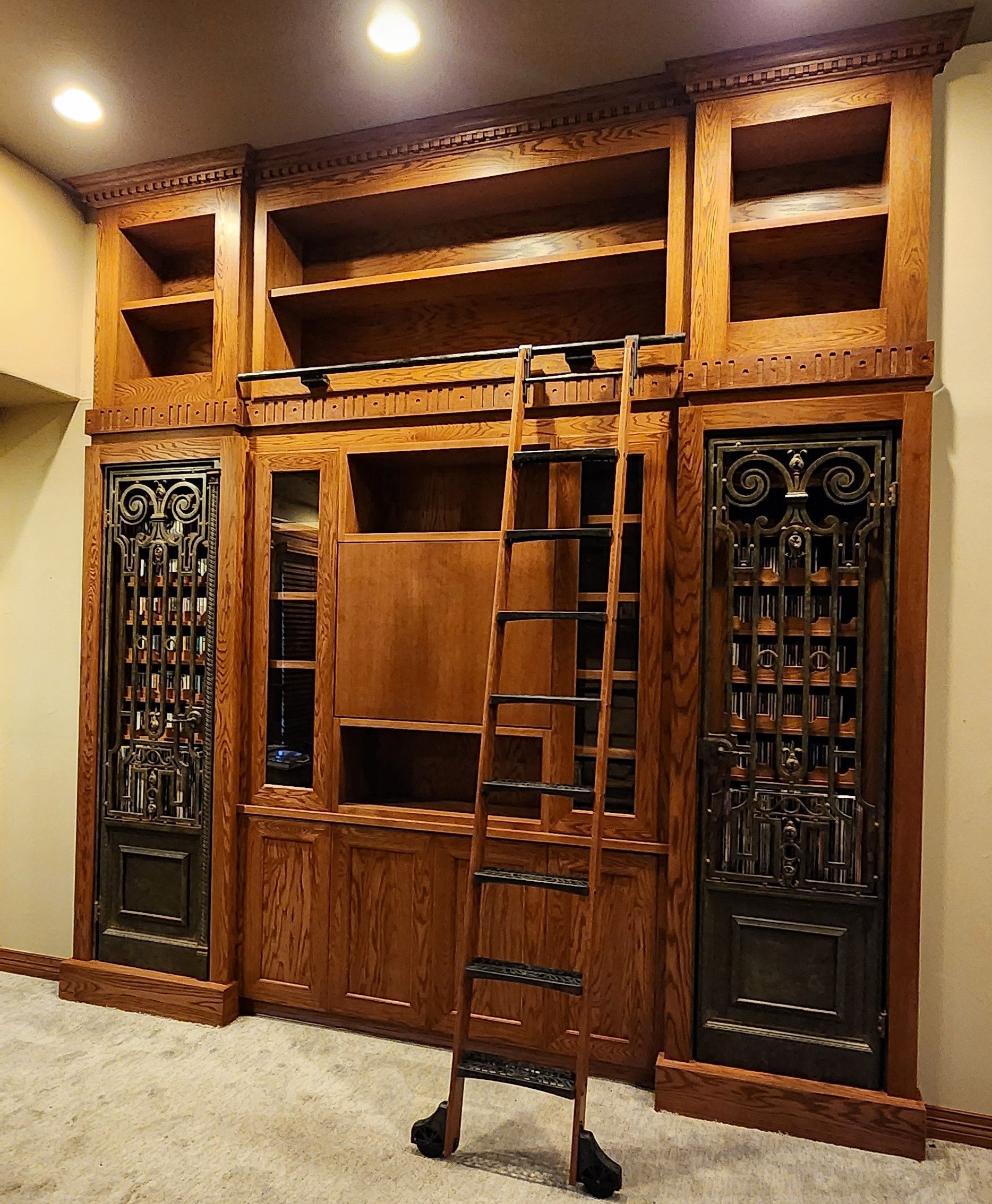 A room with a desk and a bay window