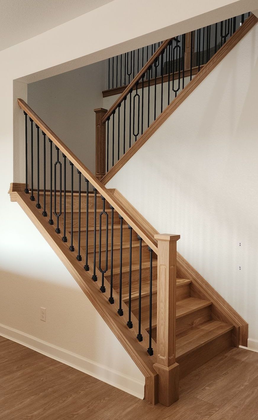 A staircase leading up to a second floor in a house.