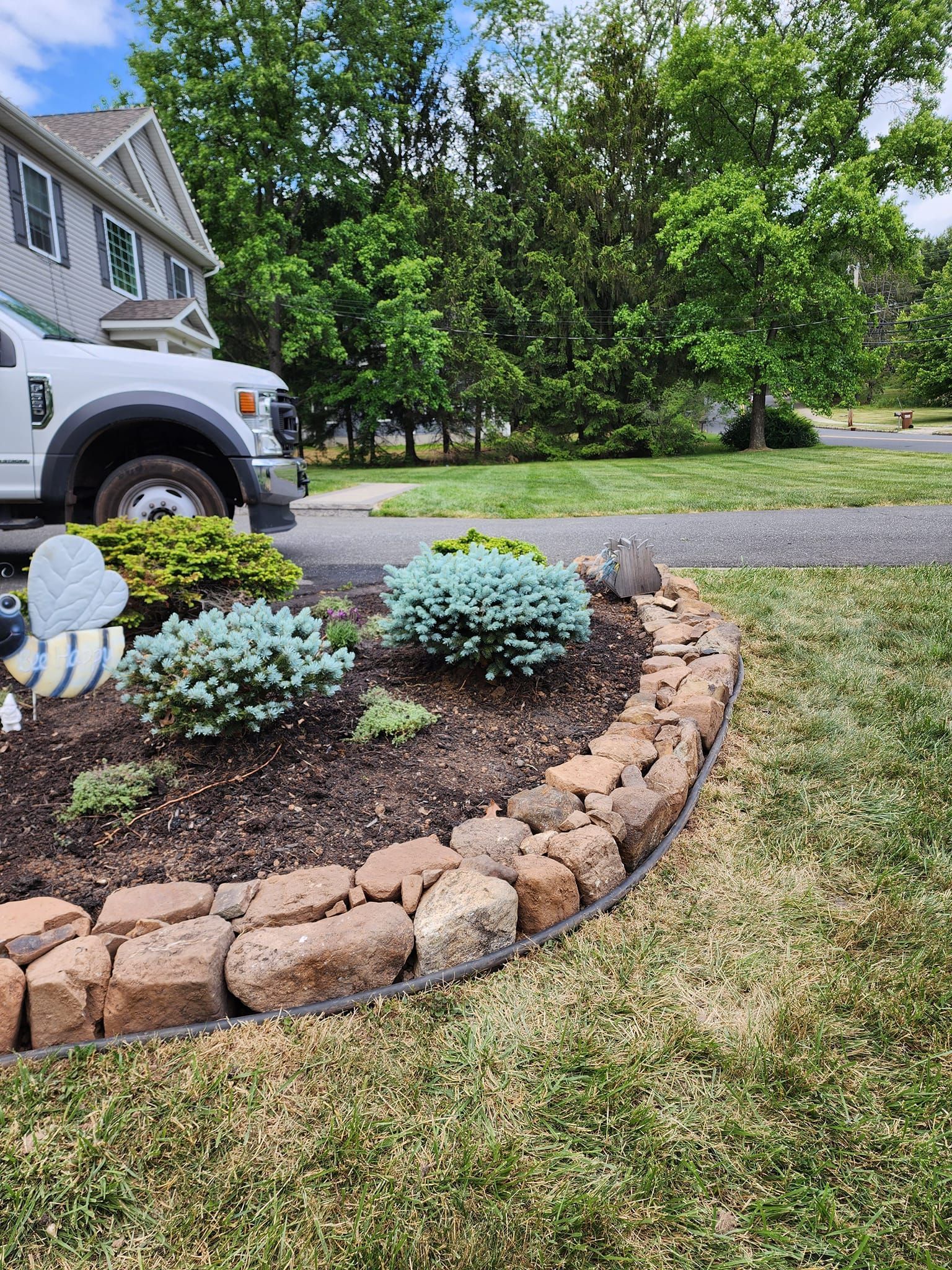 Grow your curb appeal with a flowerbed installation in Somerville, NJ - L&L Custom Landscape Design hard at work