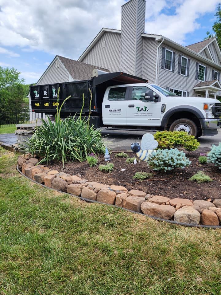 Grow your curb appeal with a flowerbed installation in Somerville, NJ - L&L Custom Landscape Design hard at work 
