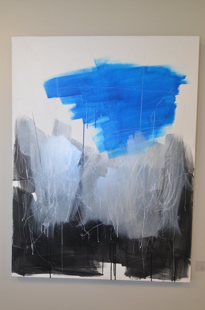 A black and white painting with a blue brush stroke