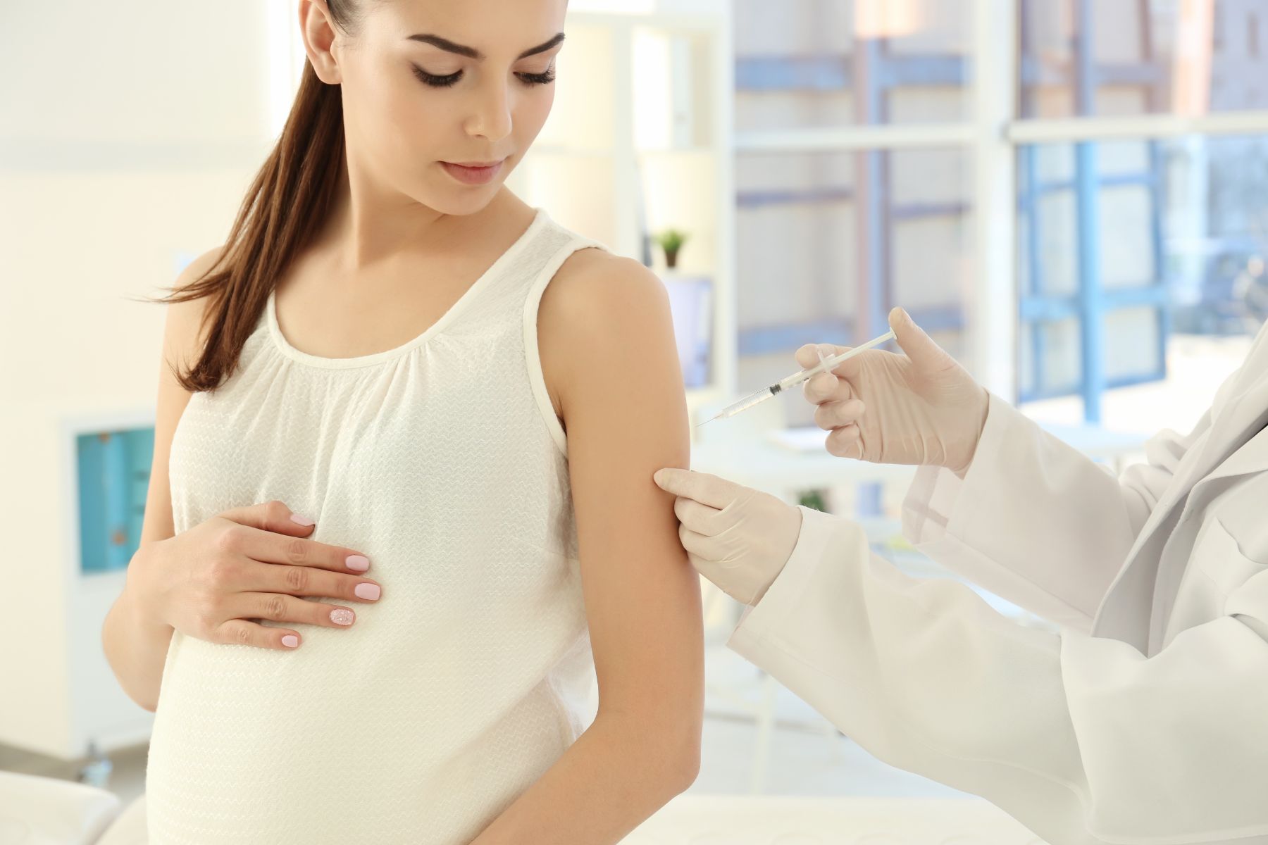 https://lirp.cdn-website.com/627fdb9e/dms3rep/multi/opt/pregnant+woman+receiving+vaccine-1920w.jpg