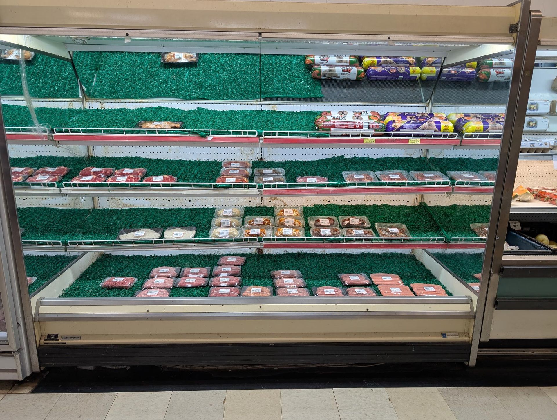 There Are Many Different Types of Meat on the Cutting Board — Howard Springs Supermarket In Howard Springs, NT