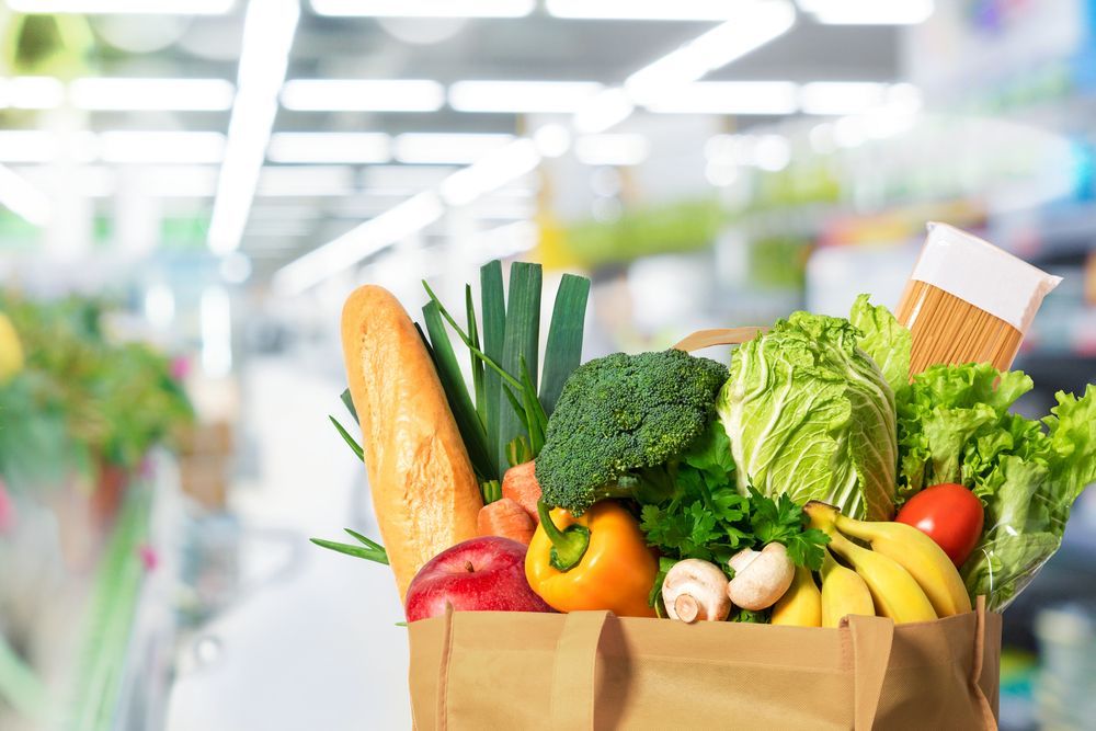 A Paper Bag Filled With Fruits and Vegetables in a Supermarket — Howard Springs Supermarket In Howard Springs, NT