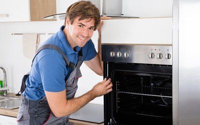Oven — Man Fixing Oven in Southern California, US