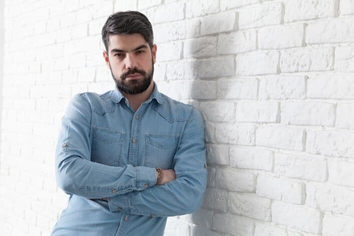 Man Standing in the Wall — Philadelphia, PA — Carmine's Hair Studio
