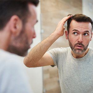 Men is Worried About Hair Loss — Philadelphia, PA — Carmine's Hair Studio