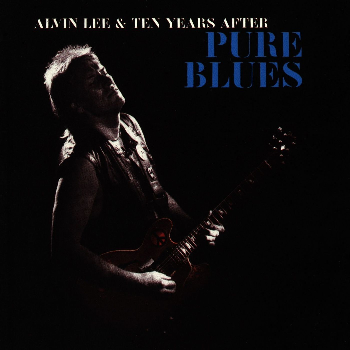 Album cover featuring Alvin Lee playing a guitar, against a dark background. Text reads