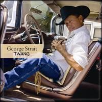 George Strait in a car, wearing a cowboy hat and holding an object. He is leaning back, dressed in jeans and a white shirt.