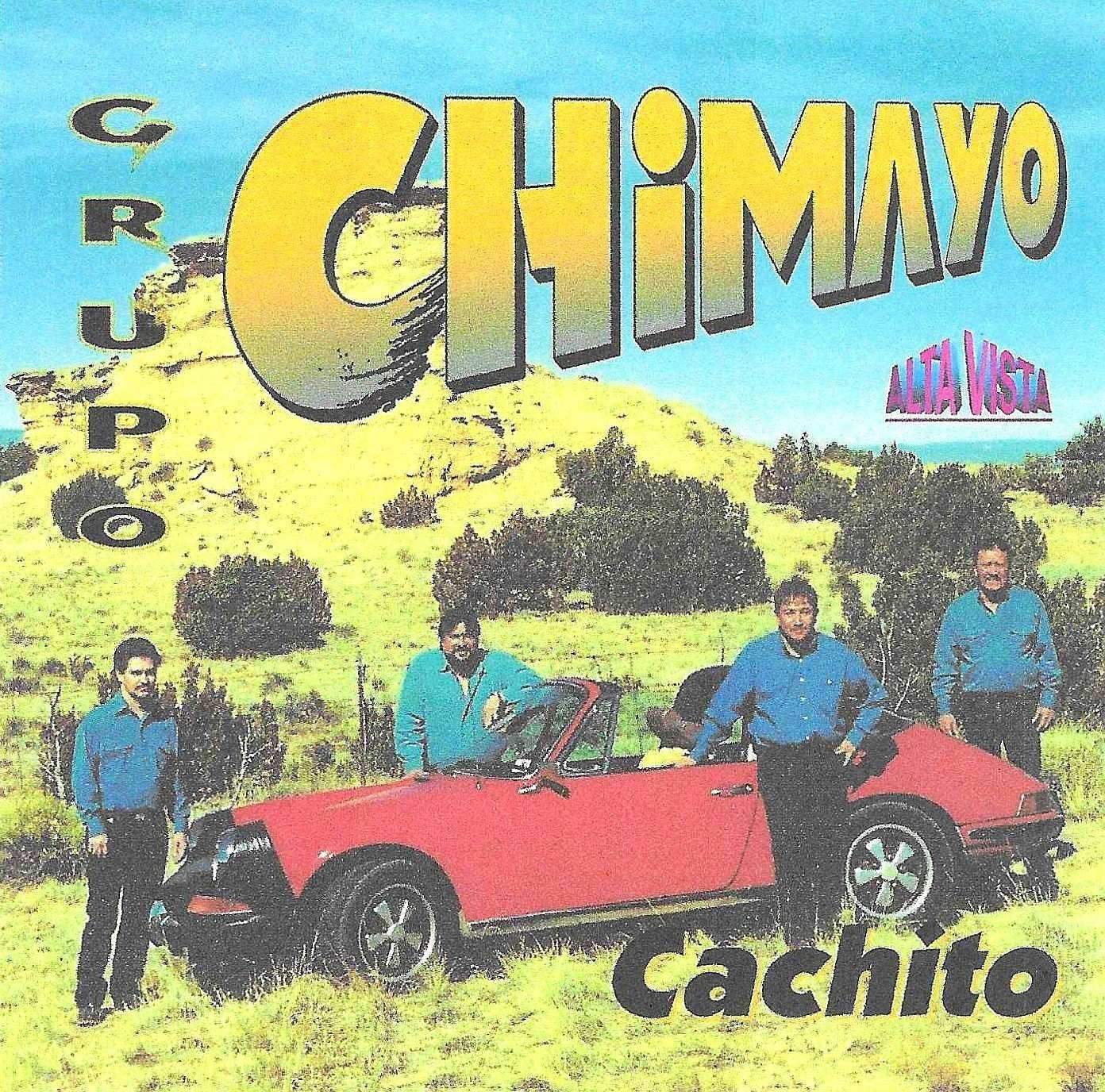 Album cover: Grupo Chimayo posing with a red car in a rural landscape. Title