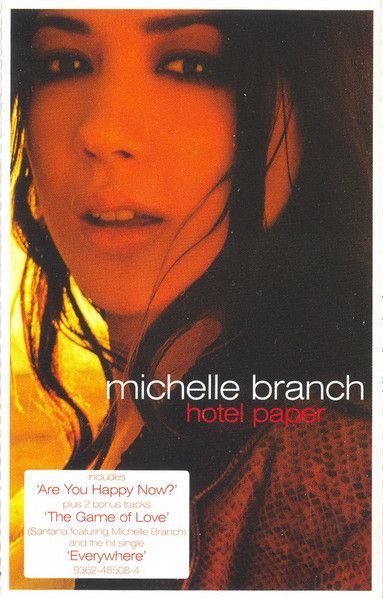 Michelle Branch on a red-toned CD cover. She looks up with long dark hair, the album title
