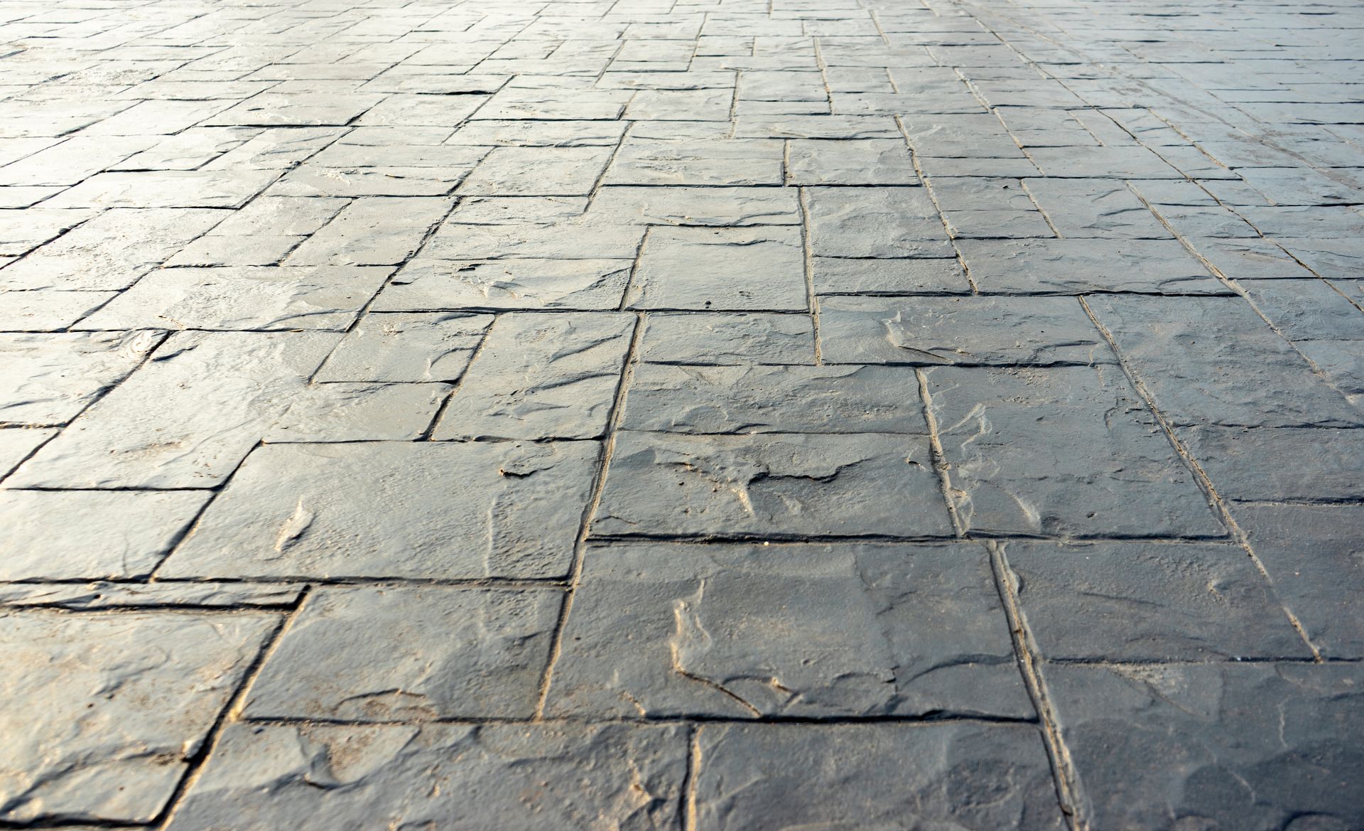 greyish stamped concrete