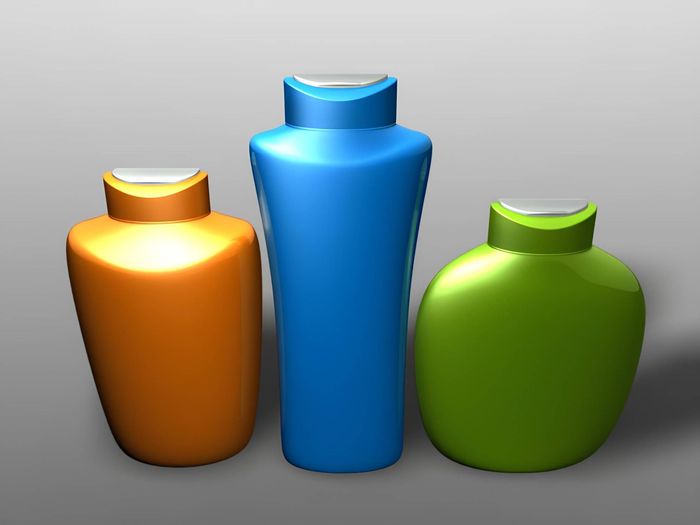 Rendered image depicting designer bottles and flip-top caps.