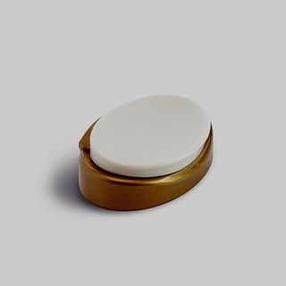 Photo of a designer oval-shaped flip-top cap.
