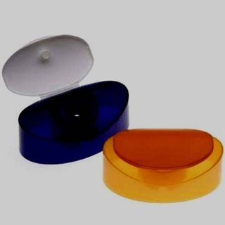 Photo of a designer oval-shaped flip-top cap.