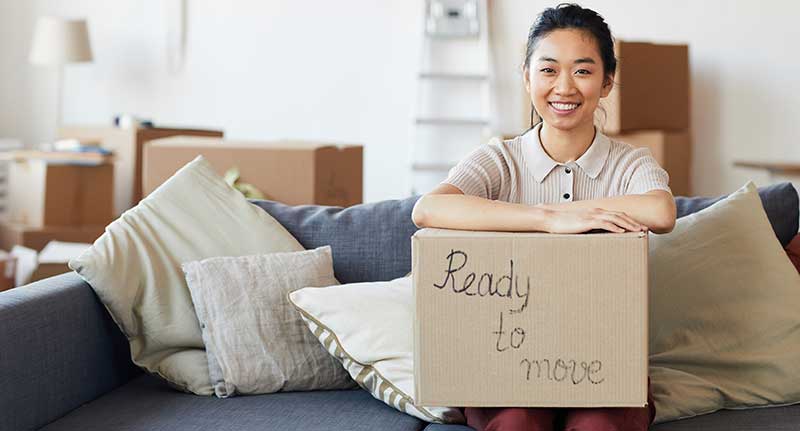 Woman Holding Cardboard Box With Ready to Move