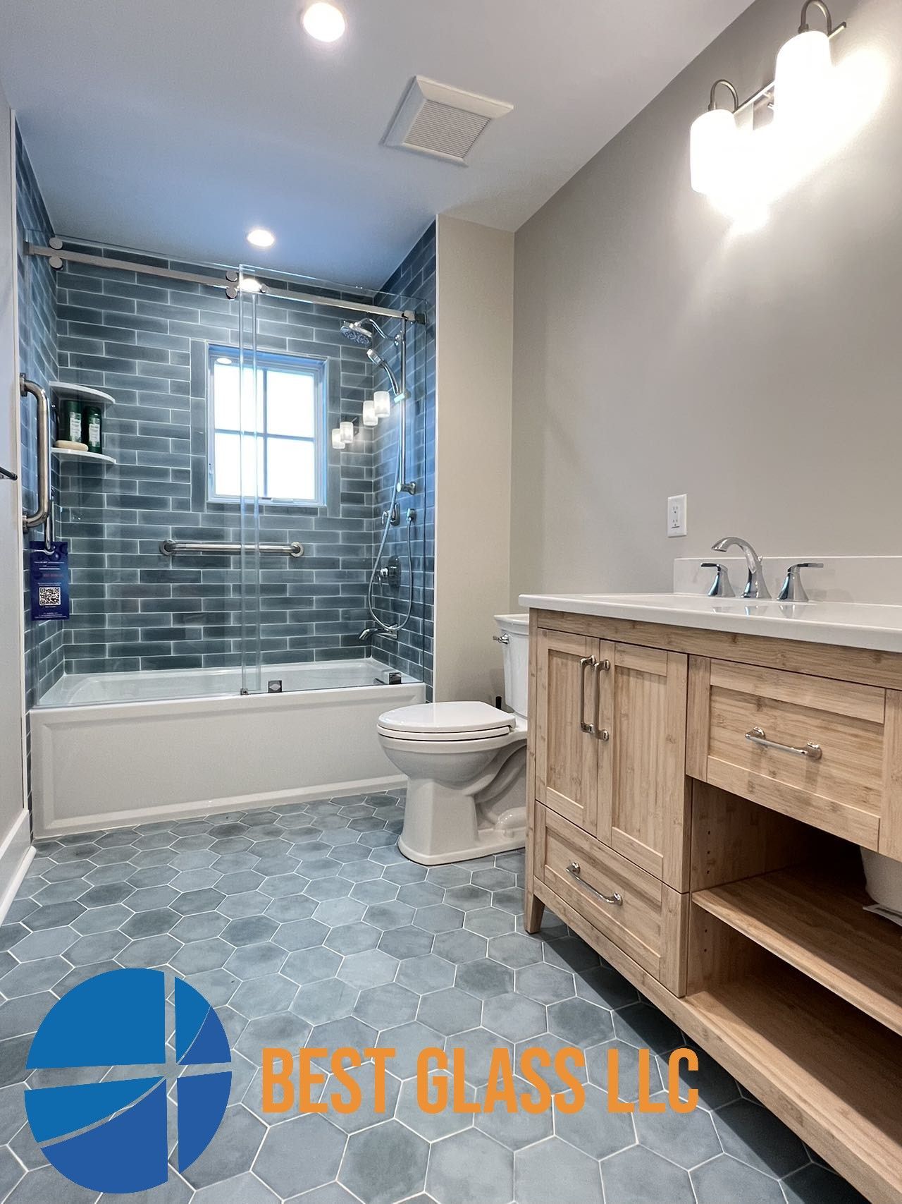 A bathroom with a tub , toilet , sink and shower.