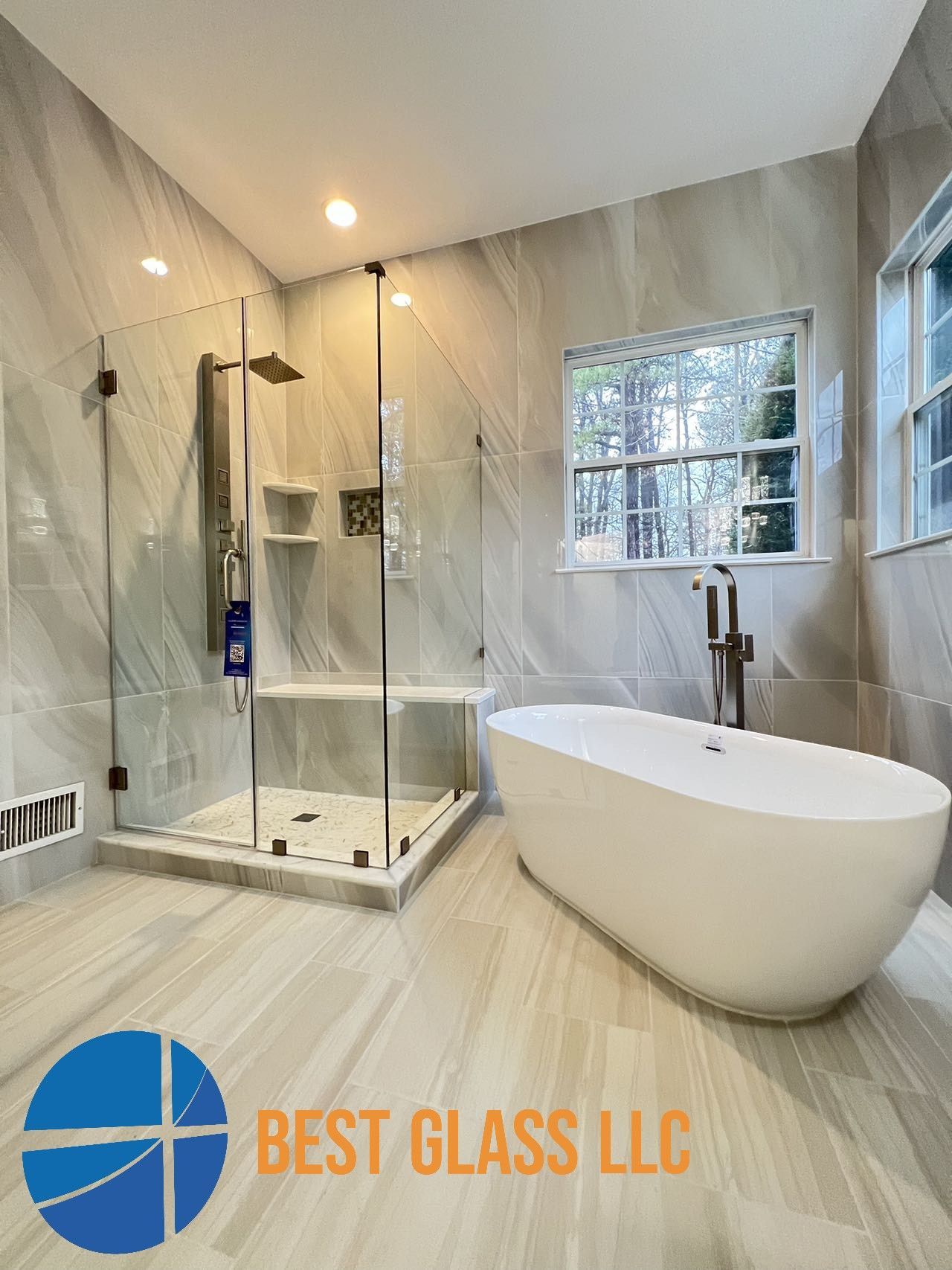 A bathroom with a tub , shower , and window.