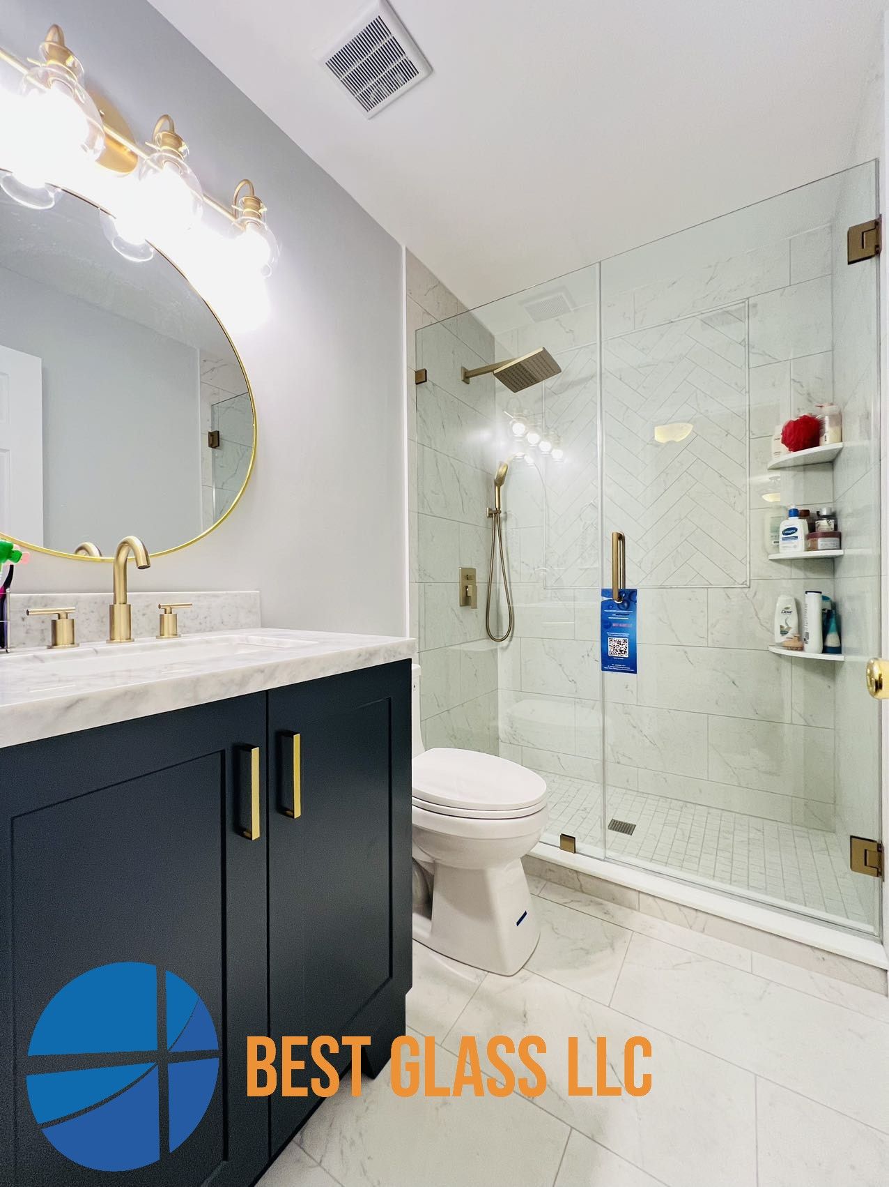 A bathroom with a toilet , sink , mirror and shower.