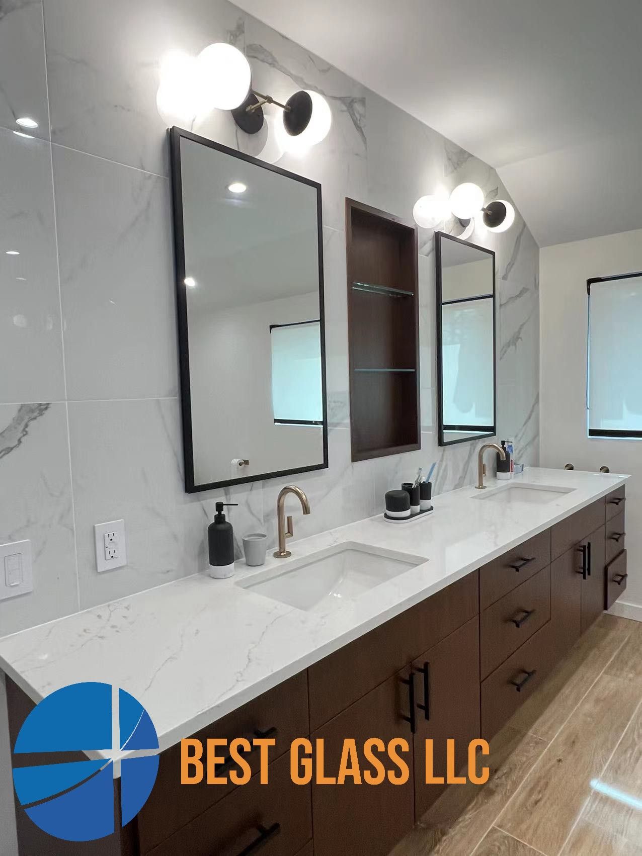 A bathroom with two sinks and two mirrors.