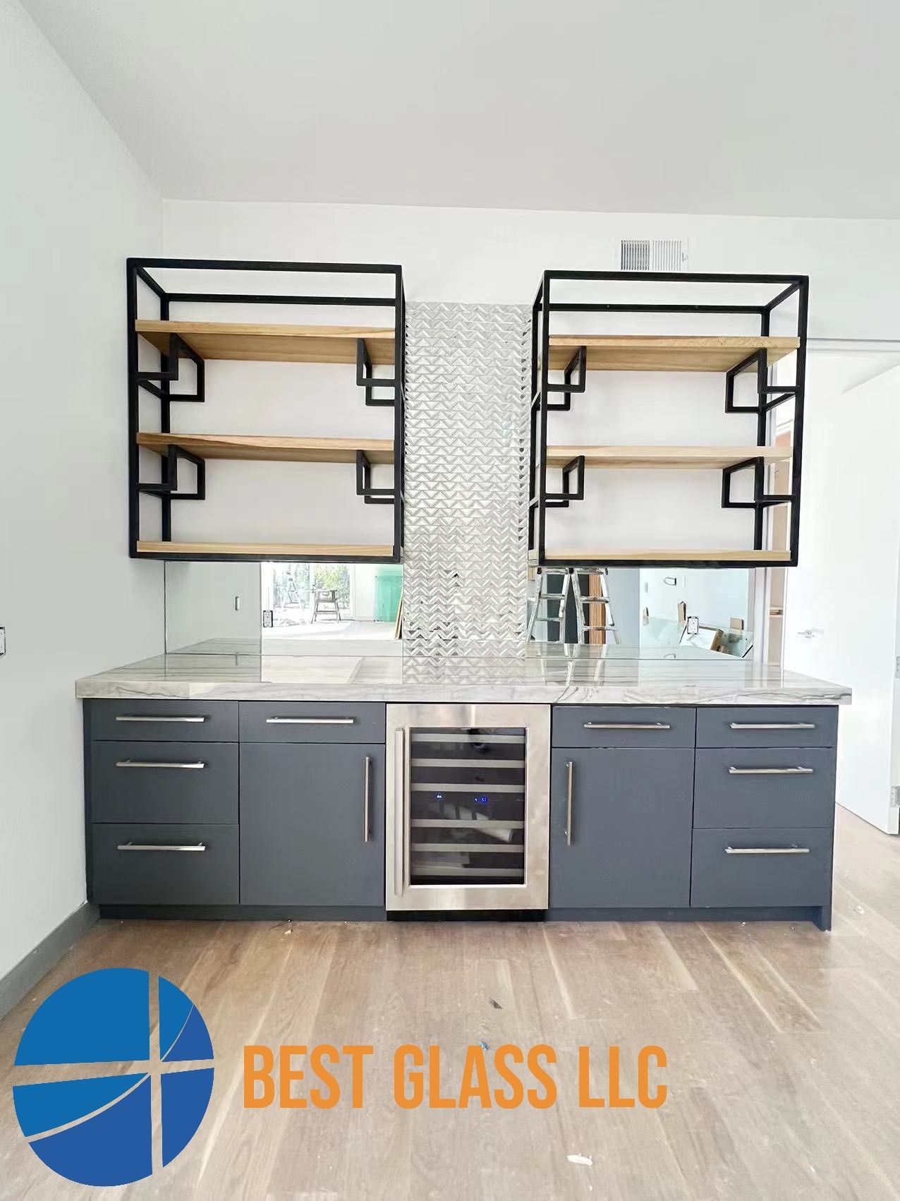 A picture of a kitchen with the words best glass llc on the bottom