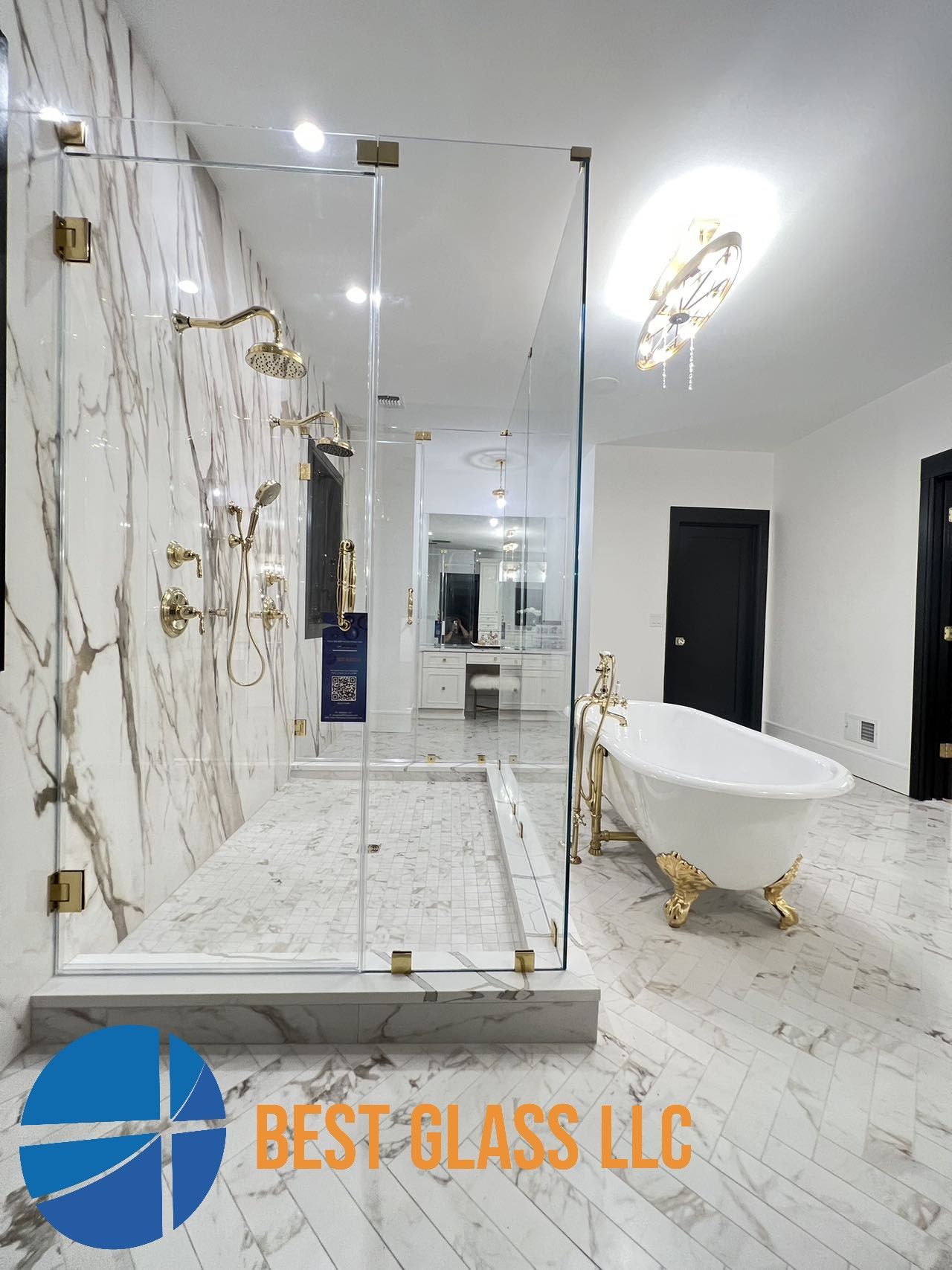 A bathroom with a walk in shower and a bathtub.