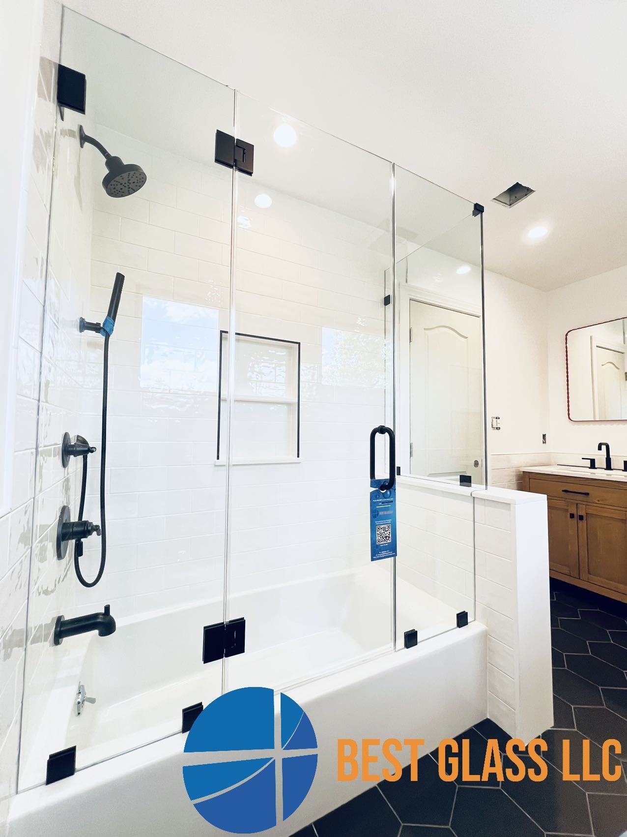 A bathroom with a bathtub and a shower.