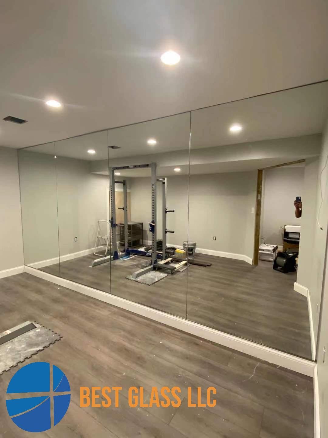 There is a large mirror in the middle of the room.