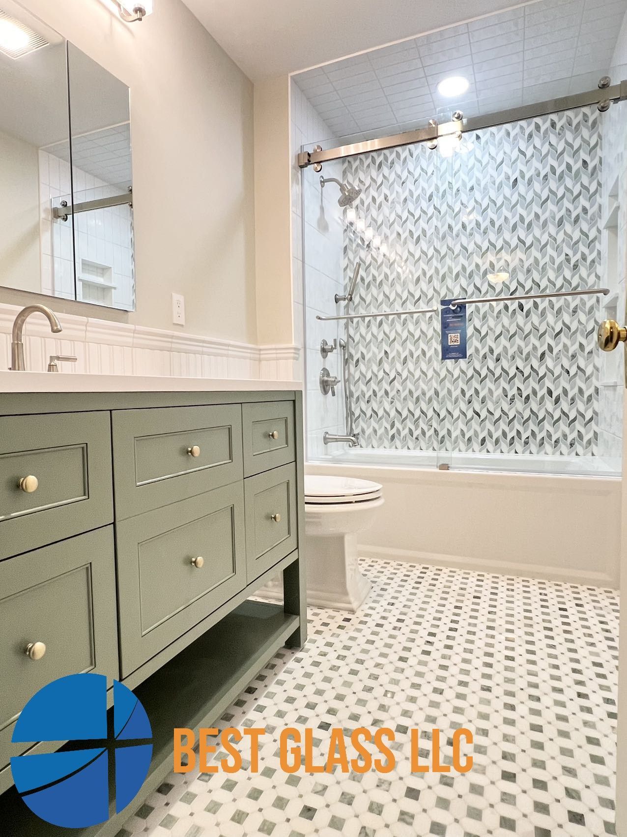 A bathroom with a bathtub , sink , toilet and mirror.