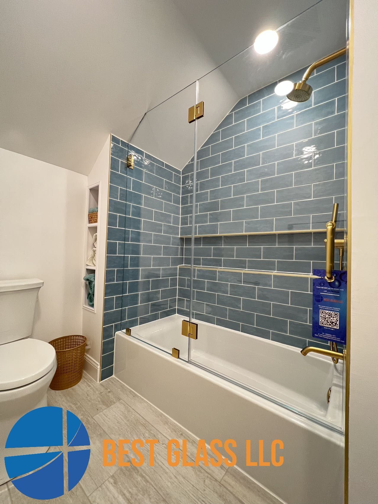 A bathroom with a bathtub , toilet and shower.