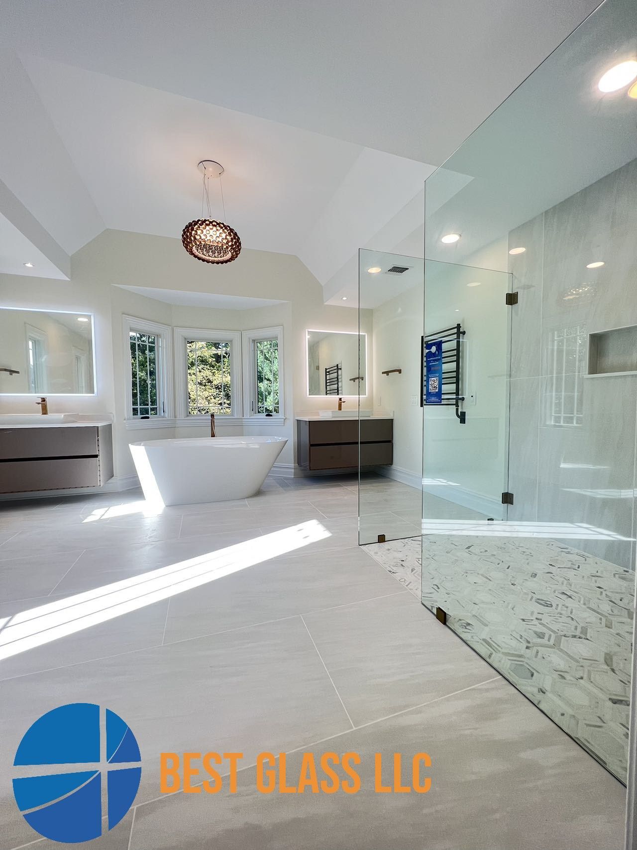 A bathroom with a bathtub and a walk in shower.