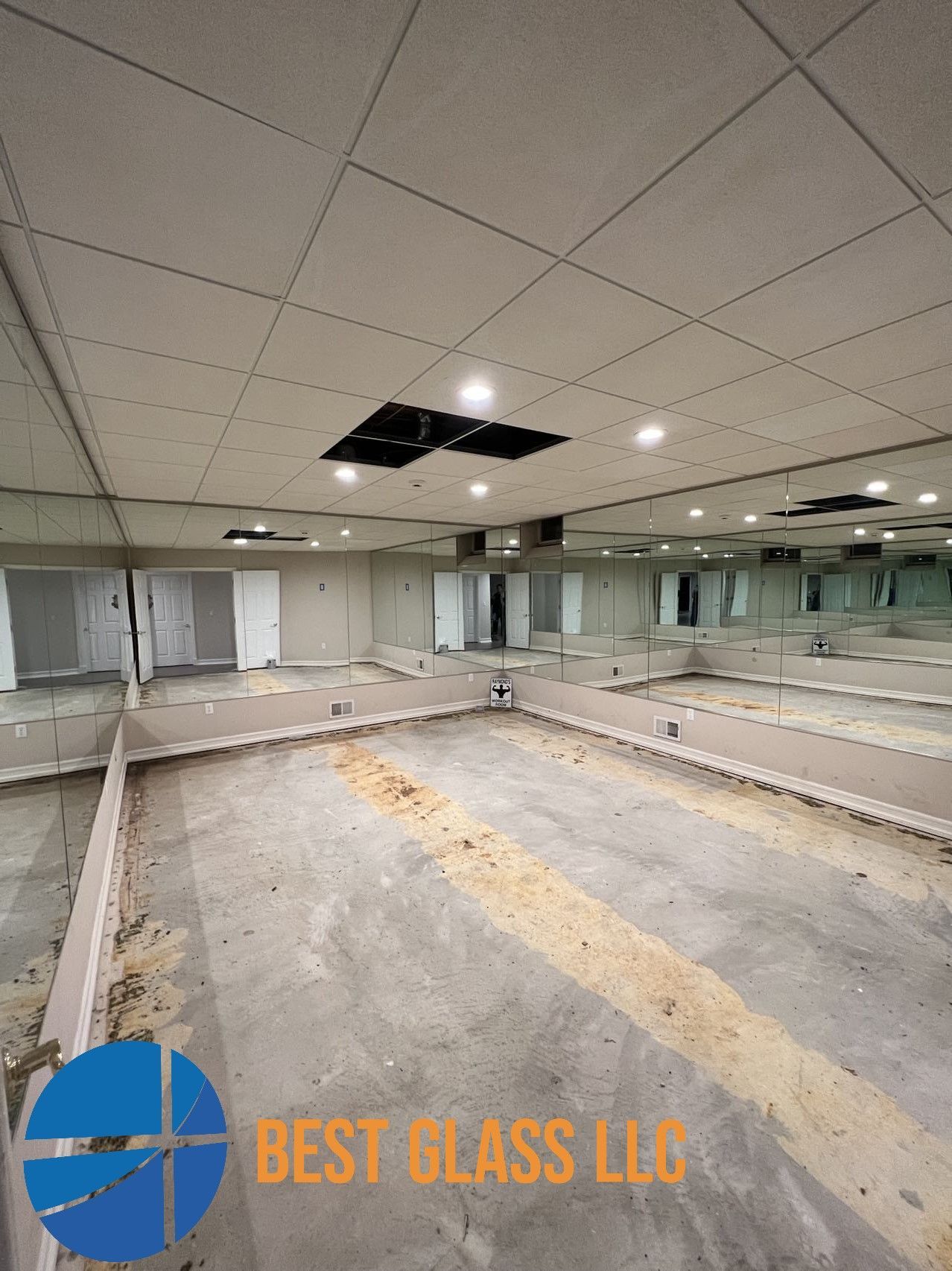 A large room with a lot of mirrors on the wall and ceiling.