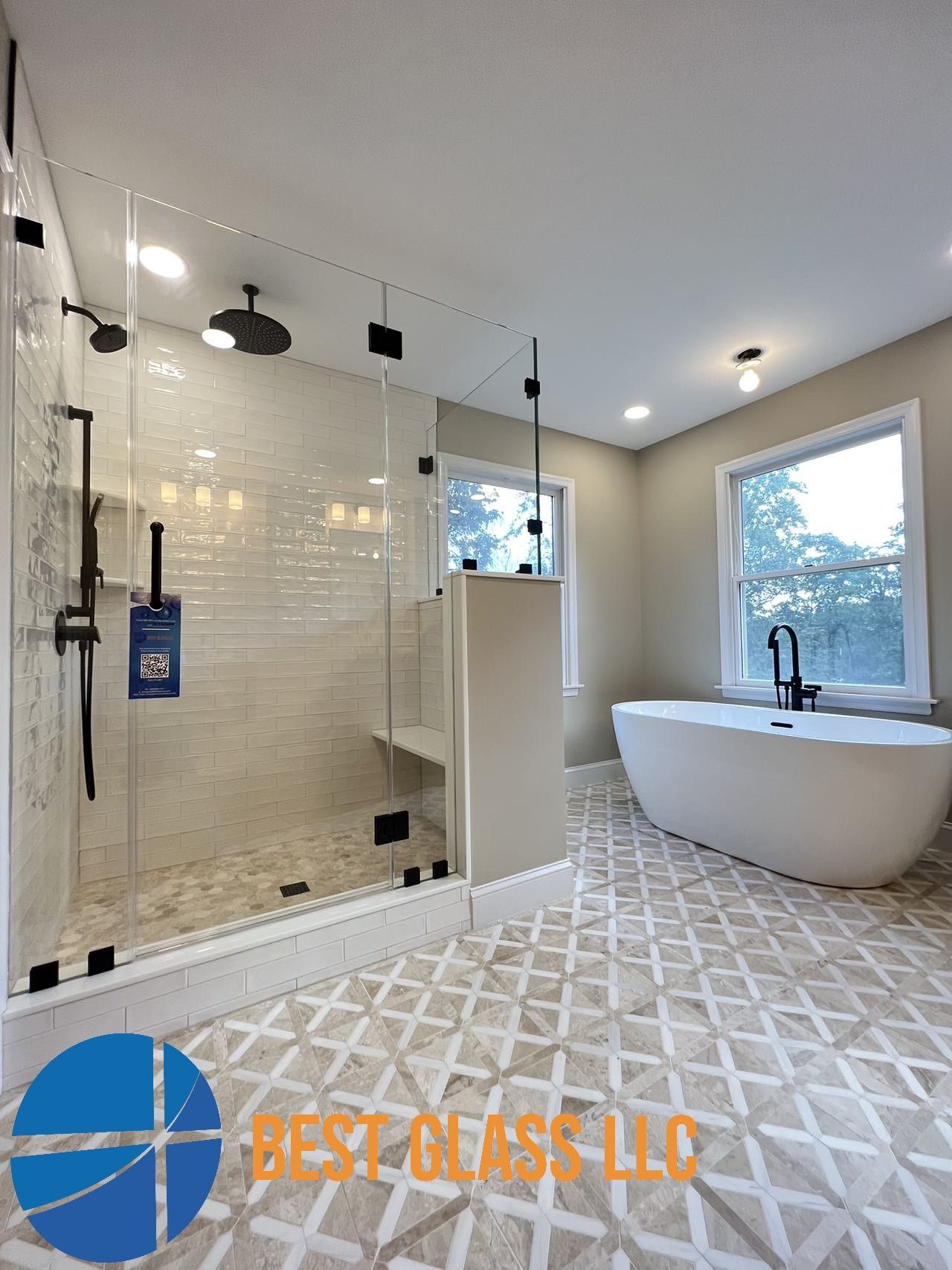 A bathroom with a tub , shower , and window.