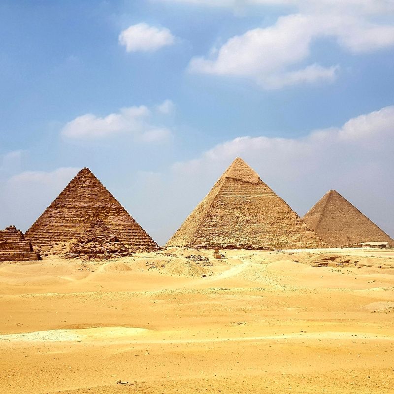 Experience the timeless wonder of Egypt with High End Journeys. This stunning image of the pyramids rising against a clear blue sky captures the grandeur and mystery of the ancient world. High End Journeys invites you to explore the highlights of Egypt, from the iconic Pyramids of Giza and the Sphinx to the treasures of the Egyptian Museum and the temples of Luxor and Aswan. Sail the Nile in style, uncover hidden tombs in the Valley of the Kings, and immerse yourself in rich culture and history. Discover Egypt in comfort and depth with High End Journeys.