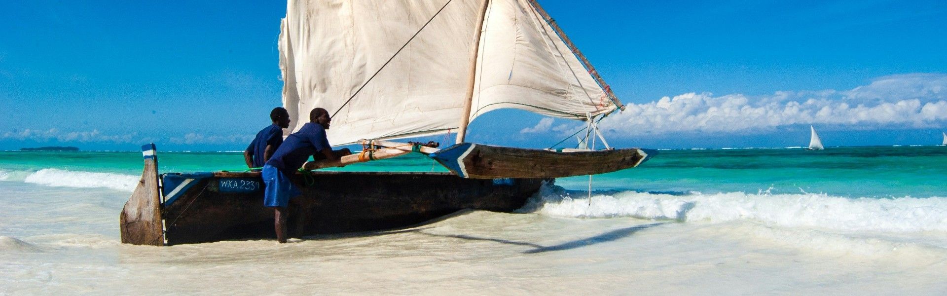 Travel to Zanzibar with Africa DMCs. The doors are opening wider to one of East Africa’s most captivating island destinations—an idyllic paradise of turquoise waters, white-sand beaches, spice plantations, and rich Swahili culture. Discover hidden gems like the historic alleys of **Stone Town**, a **UNESCO** World Heritage Site, or the crystal-clear lagoons of **Mnemba Island**. Let our trusted local partner, **Colors of Zanzibar DMC**, craft a tailor-made journey designed just for you.