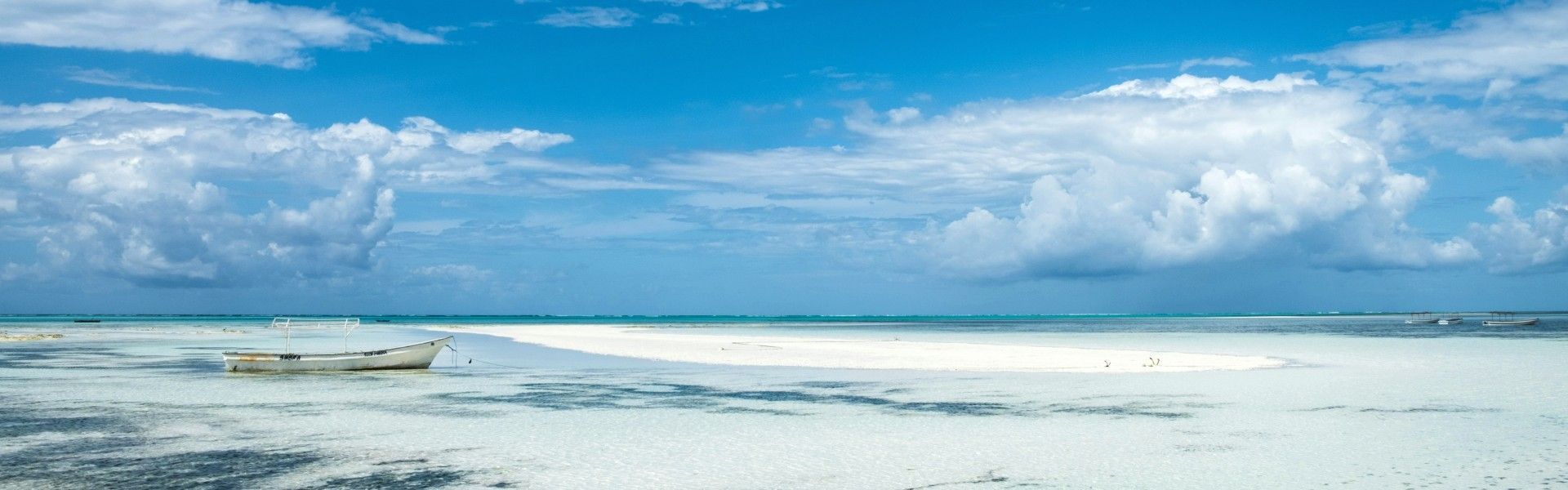 Travel to Zanzibar with Africa DMCs. The doors are opening wider to one of East Africa’s most captivating island destinations—an idyllic paradise of turquoise waters, white-sand beaches, spice plantations, and rich Swahili culture. Discover hidden gems like the historic alleys of Stone Town, a UNESCO World Heritage Site, or the crystal-clear lagoons of Mnemba Island. Let our trusted local partner, Colors of Zanzibar DMC, craft a tailor-made journey designed just for you.