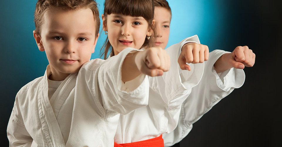 kids having fun practicing karate