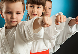 kids having fun practicing karate