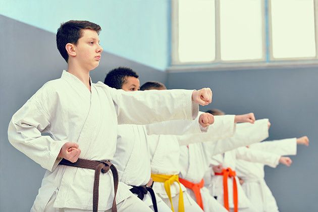 young kids practicing karate