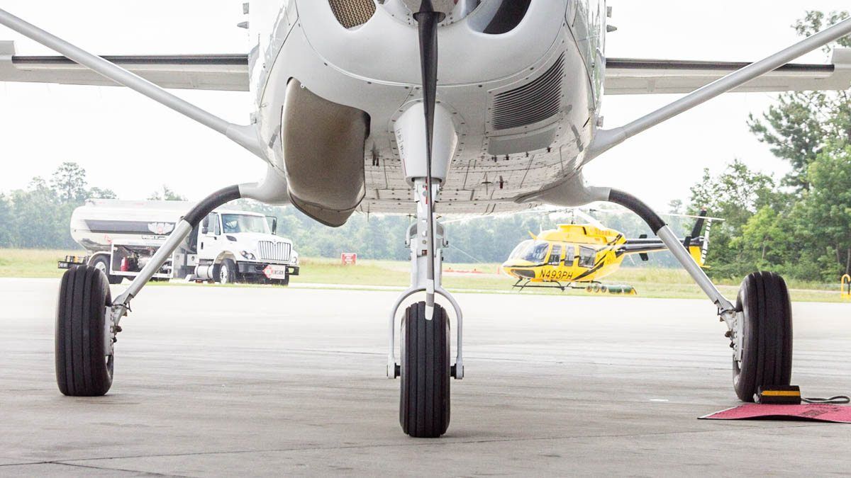 a grounded Cessna Caravan awaits an AOG delivery from Tailwind