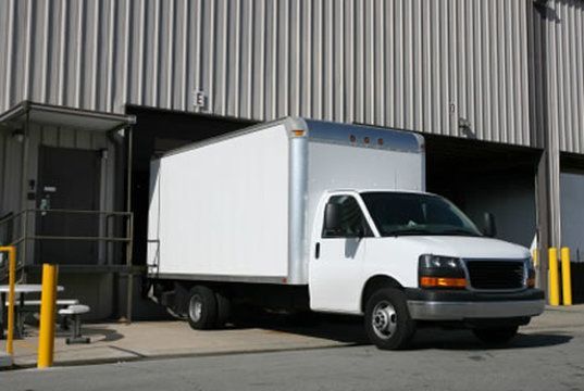 Box van loading at a NJ warehouse loading dock