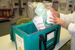 samples being removed from cooler after a courier delivery