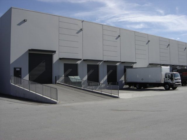 loading docks with a box truck making an expedited delivery