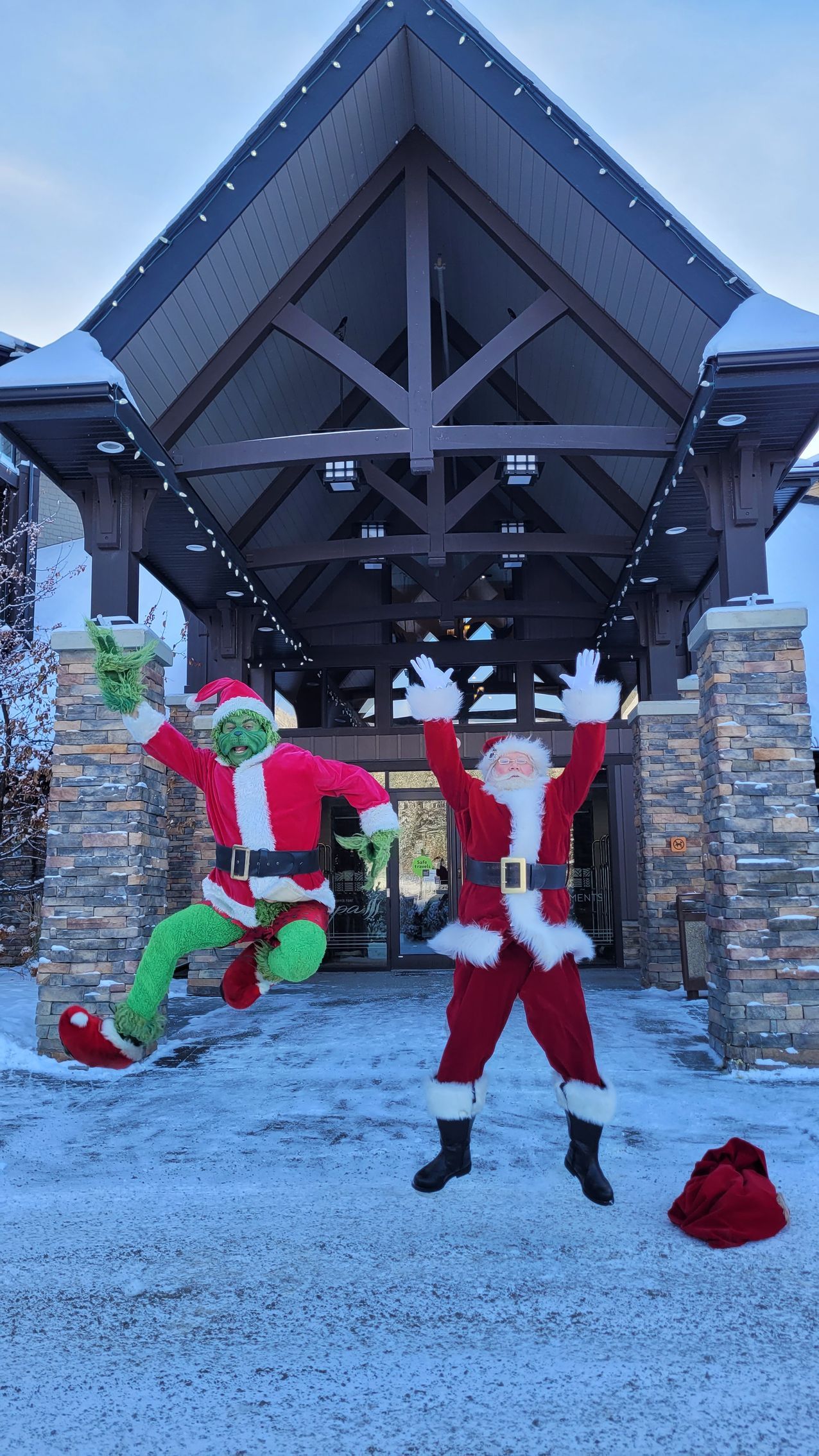 santa and the grinch perform at corporate holiday event