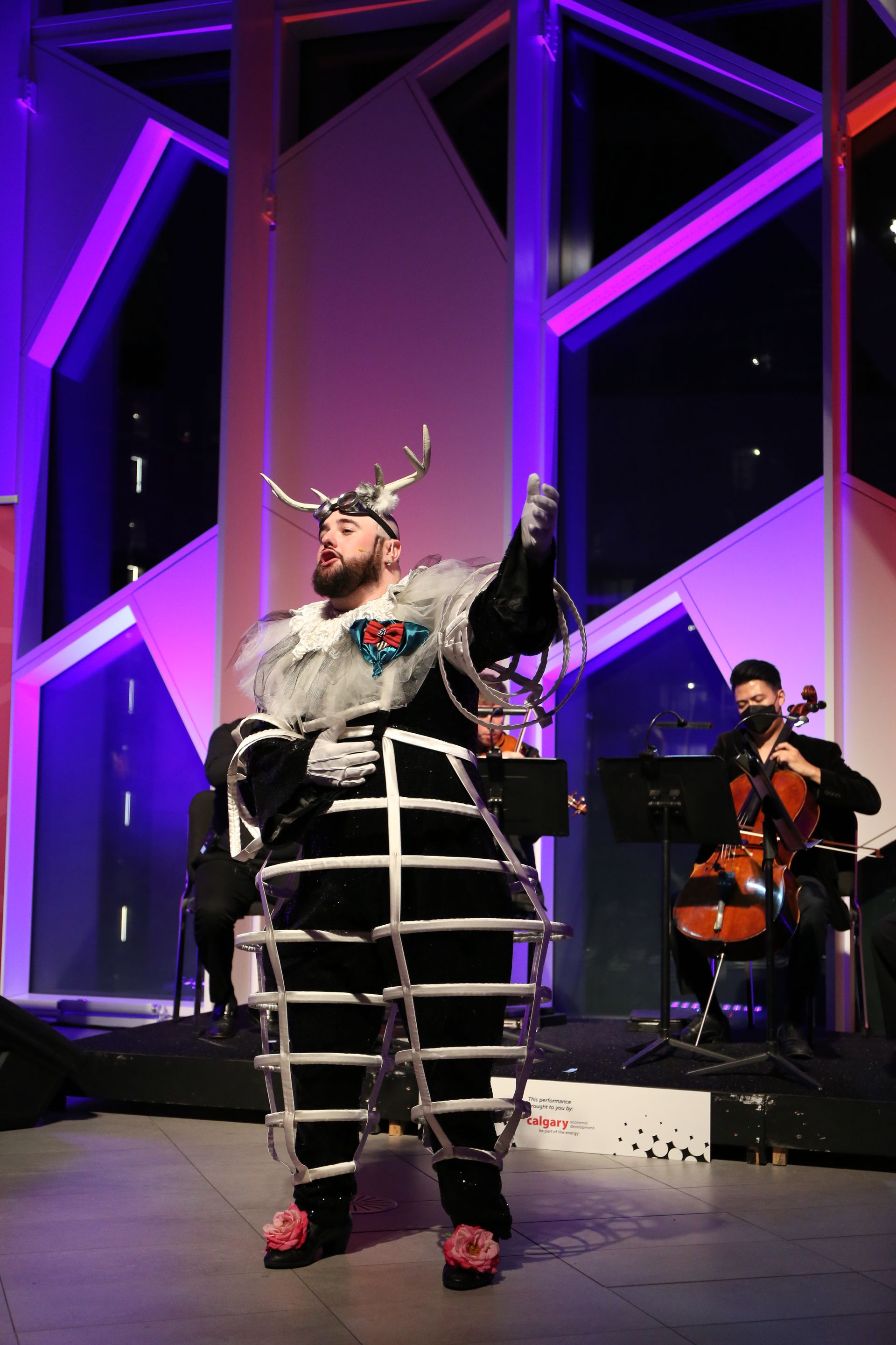 Costumed entertainer performs at the Calgary Central Library, Lit Gala