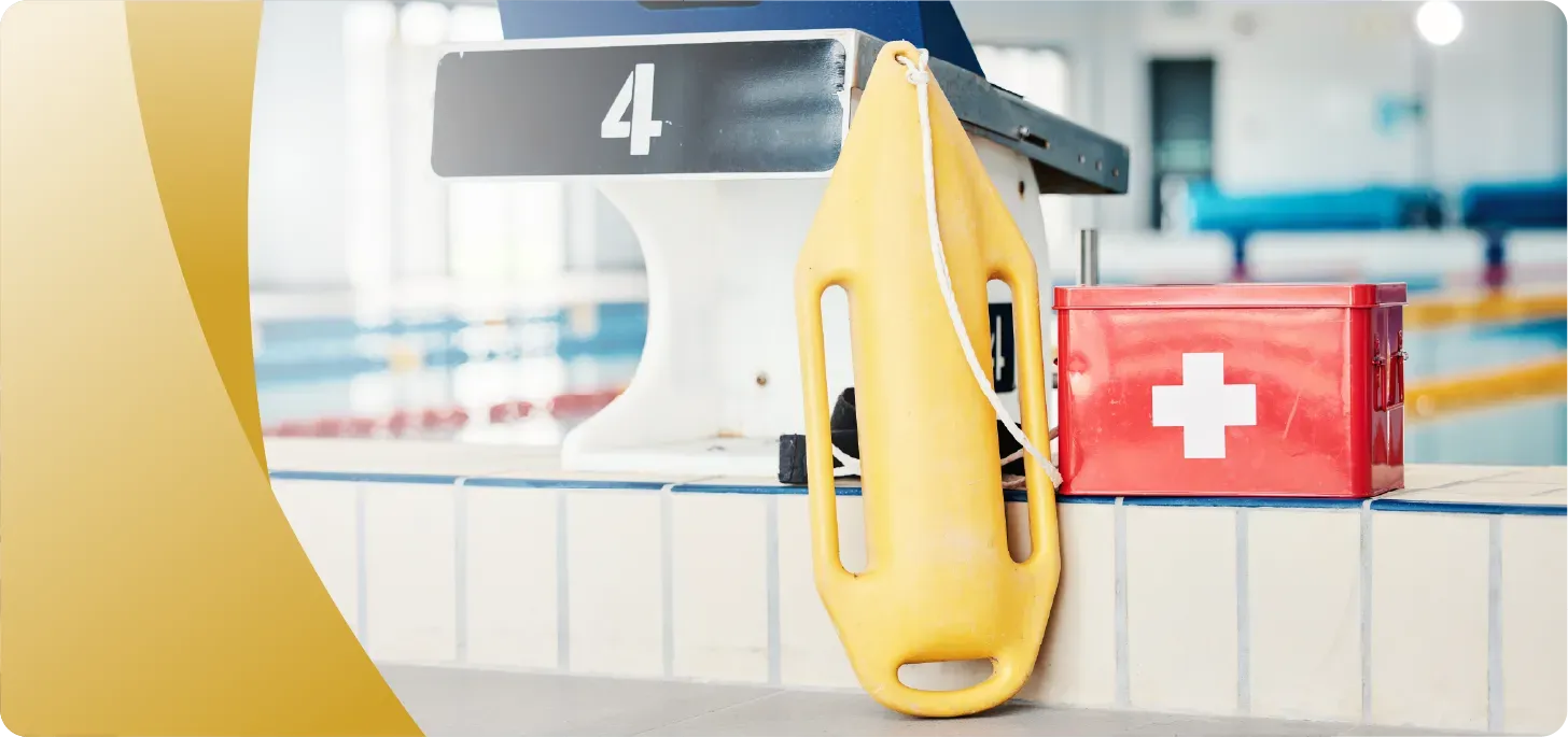 Image of water safety Lifeguard equipment by a pool