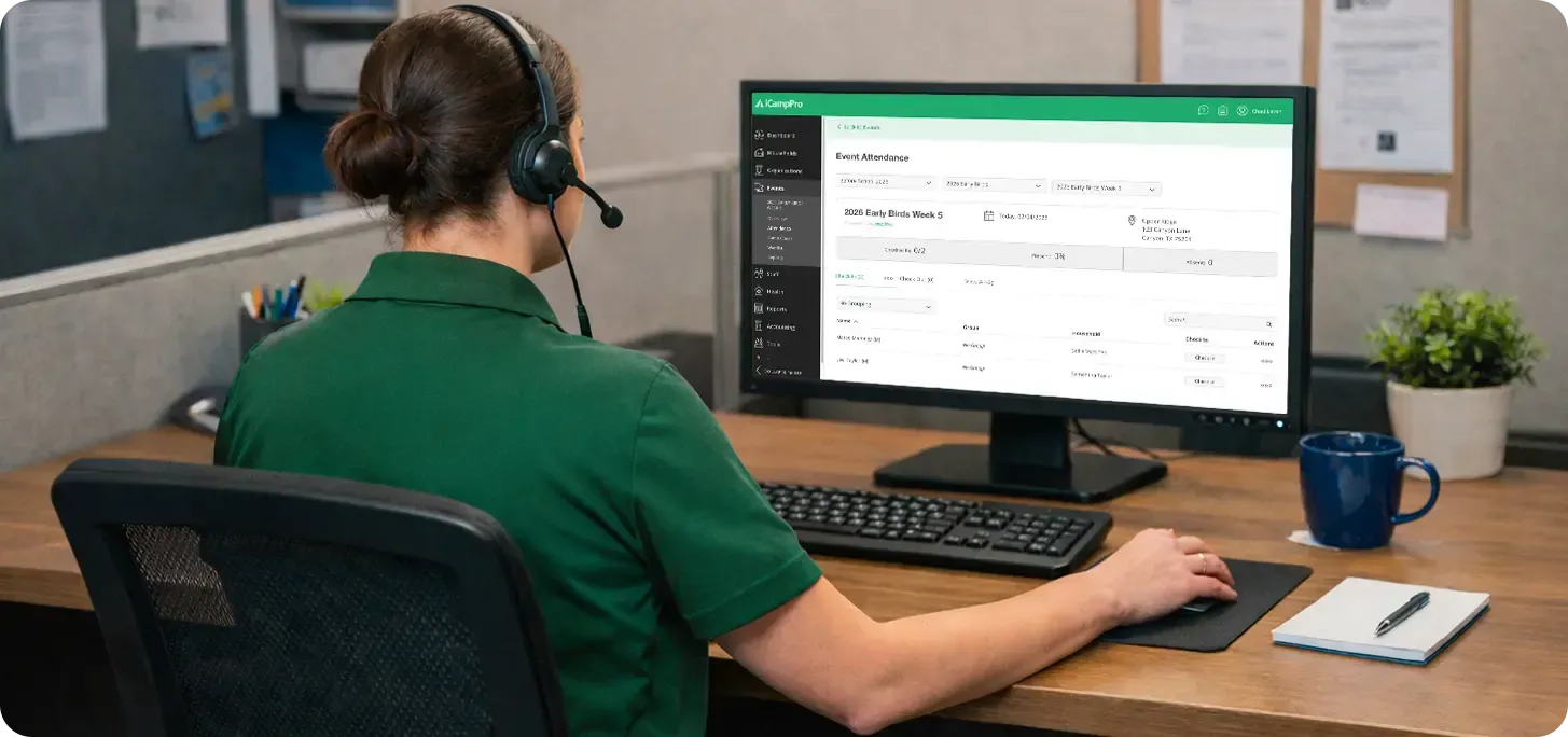 Image of team member wearing a headset and using the iCampPro software.