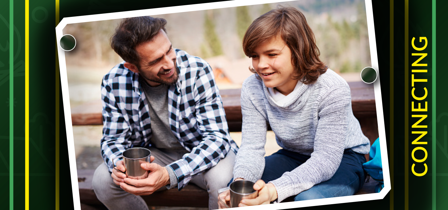 Benefits of campers staying connected to camp - two people in conversation. 